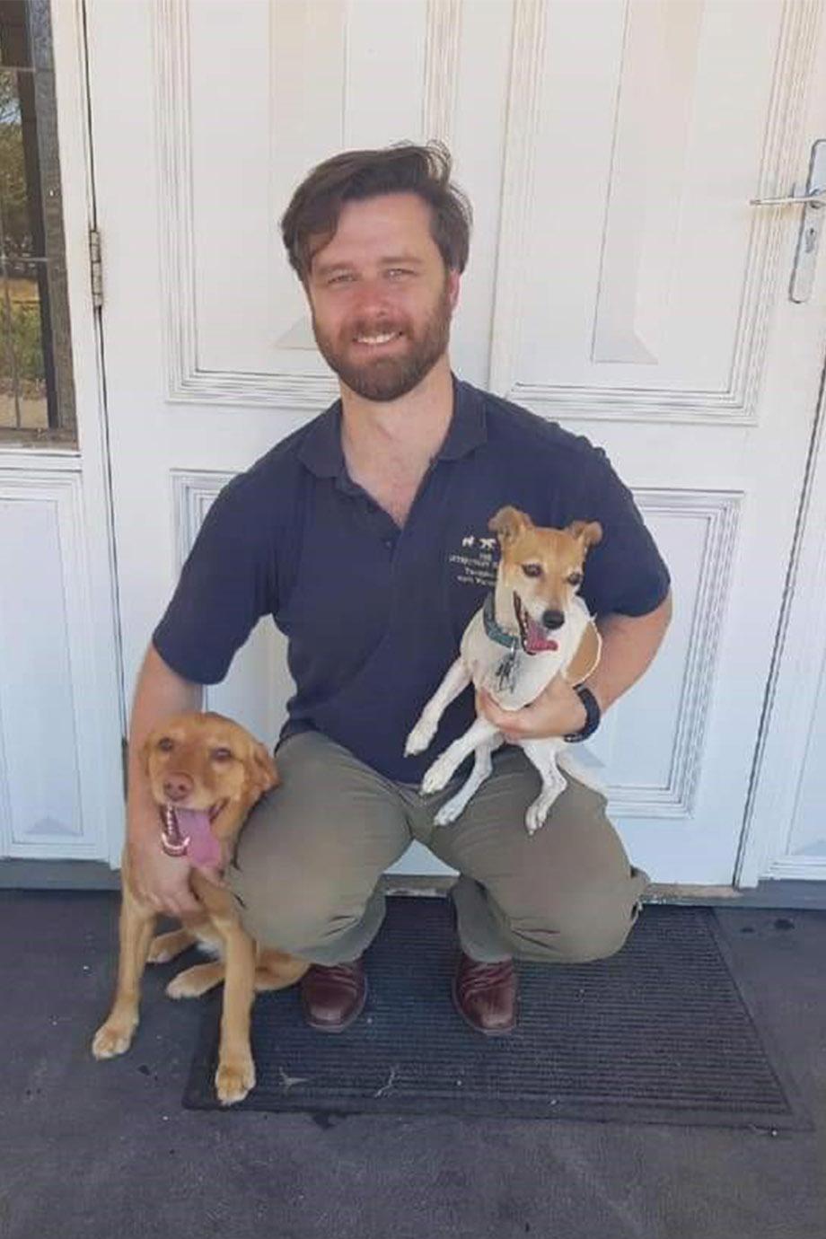 Doctor of Veterinary Medicine alumnus Phil Downey with dogs