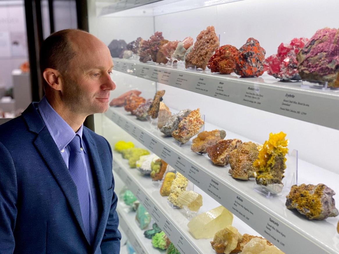 Associate Professor Carl Spandler looking at minerals from the South Australian Museum