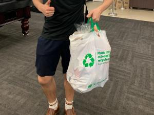 Village resident collecting his food hamper