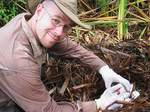 Associate Professor Corey Bradshaw working in the field, measuring and collecting saltwater crocodile eggs in the Northern Territory