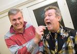 From left: Professor Alastair MacLennan from the University of Adelaide and Jimmy Barnes demonstrating how to do a cheek swab
Photo by Chris Sprod