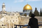 A Jewish man looks towards the wailing wall and the mosque of Al-aqsa
Photo by iStock