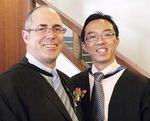Professor Barry Burgan, Head of the Adelaide Business School, pictured with one of his students, Chung Wei Tuck, who graduated with his Master of Applied Finance
Photo by Candy Gibson