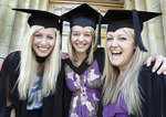 From left: Nursing graduates Emily Lutze of Ardrossan, Lois Hinkley of Prospect and Sophie Wildsmith of Nuriootpa celebrate after their University of Adelaide graduation ceremony
Photo by Dean Martin, courtesy of <i>The Advertiser</i>