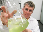 SA Water research scientist Peter Hobson with blue-green algae
Photo courtesy of SA Water