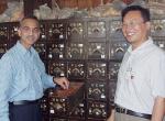 Dr Afzal Mahmood (left) with a village doctor in Qufu County, Shandong