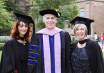 Sophie Karanicolas (left) and Catherine Snelling (right) photographed with the Dean of the School of Dentistry, Professor Johann de Vries.