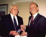 Ron Mertin (left) receives his ROCA Award of Merit from ROCA president Mark Seeliger