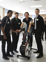 Australian womens track endurance team member Katherine Bates on a wattbike with students Arjun Palaniappan, Marek Carls and Stephen Jelfs
Photo by Michael Mullan