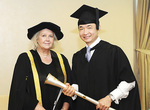 Deputy Chancellor Pamela Martin with macebearer and Most Outstanding MBA graduate Bernard How.
Photos by Joyous Asia