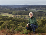 Professor Randy Stringer in the foreground of the Mt Lofty Ranges
Photo by Matt Turner, <i>The Advertiser</i>