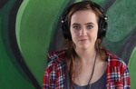 3rd year Sonic Arts student Meredith Lane in the foreground of the Morphett Street Bridge. Merediths project, Warmth and Sound Waves, forms part of the soundscape under the bridge. It was produced used temperature statistics for Adelaides CBD as a basis for sonification.
