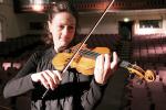 Sophie Rowell playing the Guadagnini violin in a practice session at Elder Hall prior to the 2 June concert, which attracted a capacity crowd