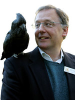 Adelaide Zoo CEO and Professor of Zoology at the University of Adelaide Chris West with Banks, a Red-tailed black cockatoo
Photo by Candy Gibson