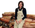 Masters student Radika Rupasinghe with banana trunks used in the creation of papyrus paper
Photo by Robyn Mills