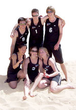 The winning team (plus reserves) in the mixed beach volleyball event