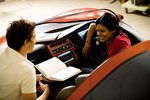 Members of the solar-electric hybrid car team Brynn De Gooyer and Nageswary Karuppiah
Photo by Randy Larcombe