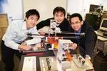 Joshua Chia, Chin Hooi Lee and Boon Yao Hong with the RoboFiddler
Photo by David Ellis