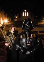 From left: University of Adelaide music student Stevan Pavlovic (tuba) with Darth Vader (aka <i>Star Wars</i> fan Matt Tucker)
Photo by Randy Larcombe