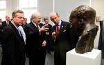 From left: The Premier, the Hon. Mike Rann, Vice-Chancellor and President Professor James McWha, and His Royal Highness the Duke of Kent inspect the new bust of Sir William Lawrence Bragg
Photo by Ben Searcy, courtesy of the Department of the Premier and Cabinet