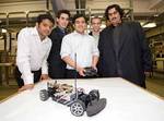 From left: Chemical Engineering students Girish Prem Kumar, George Zabanias, Kong Jin Lee, Tim Kenefick and Sanjeet Marwah with the model hydrogen fuel cell hybrid car
Photo by Peter Fisher