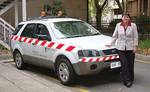 The new director of the Centre for Automotive Safety Research, Professor Mary Lydon, with the centres crash investigation vehicle
Photo by Robyn Mills