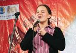 Georgina Day singing a pop song in Mandarin as part of the Chinese Proficiency Competition at the National Wine Centre
Photo by Candy Gibson