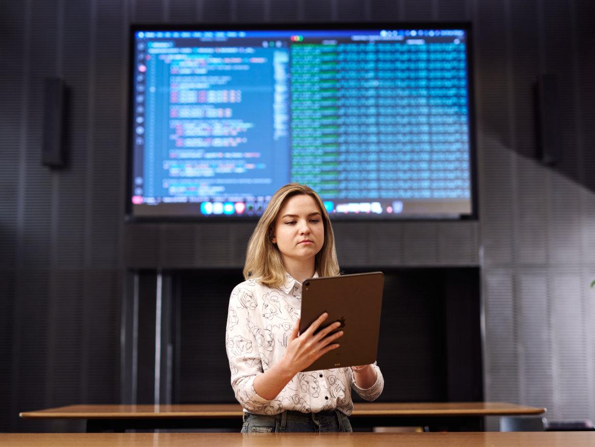 woman working on tablet computer