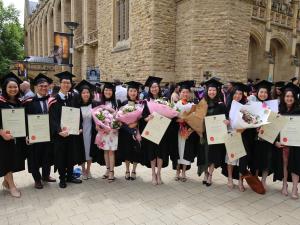 Graduates with parchments