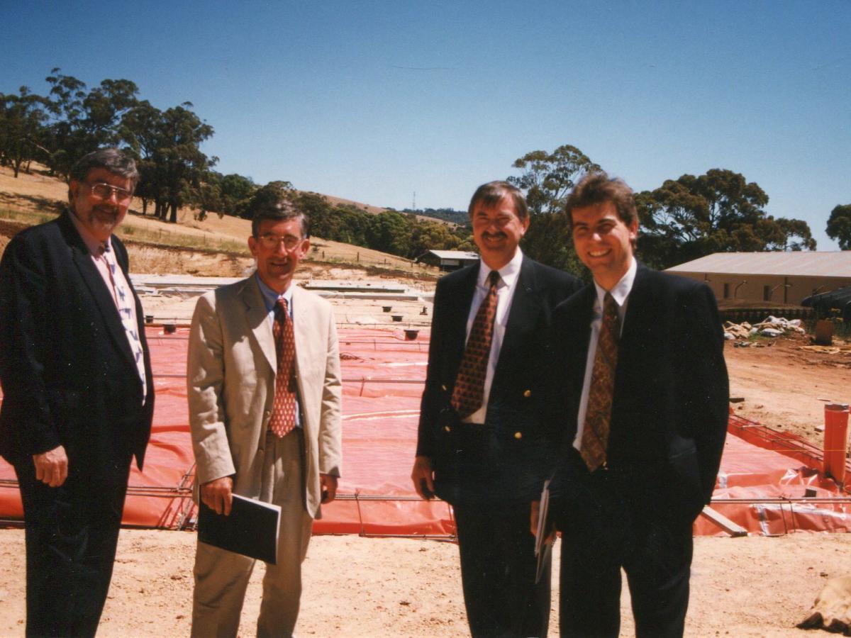On the building site of the Hickenbotham Roseworthy Wine Science Labroratory in the 1990s, L to R: Bob McLean, Mark Turnbull, Brian Croser and Professor Peter Høj (then of the department of Horticulture, Viticulture and Oenology and AWRI)