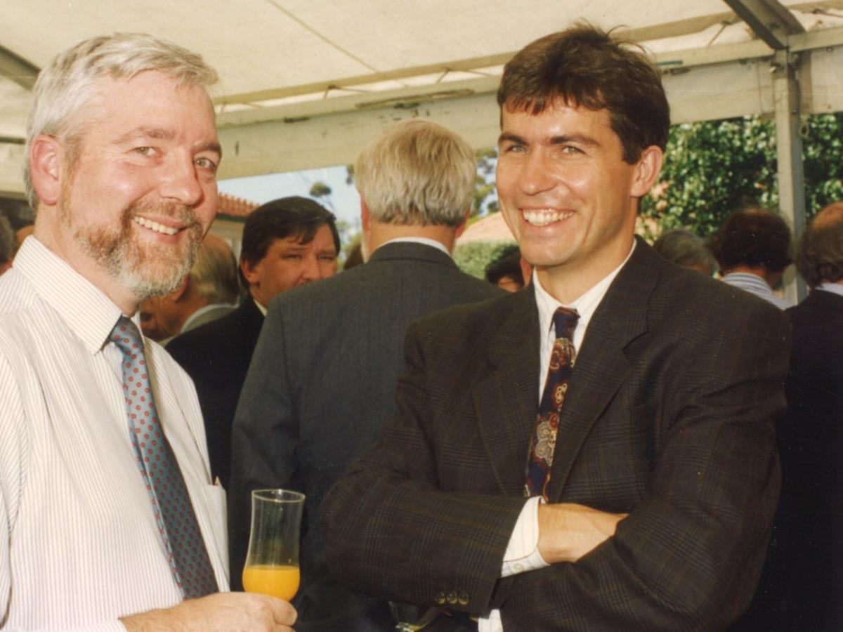 Professor Peter Hoj with Dr Paul Henschke smiling at a party