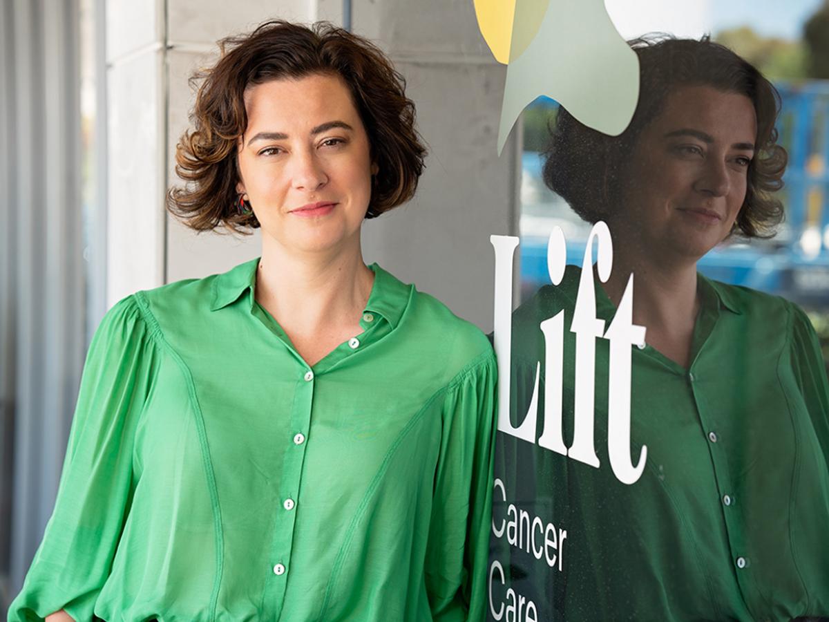 Lauren Whiting, CEO of Lift Cancer Services standing outside Lift wearing a green top