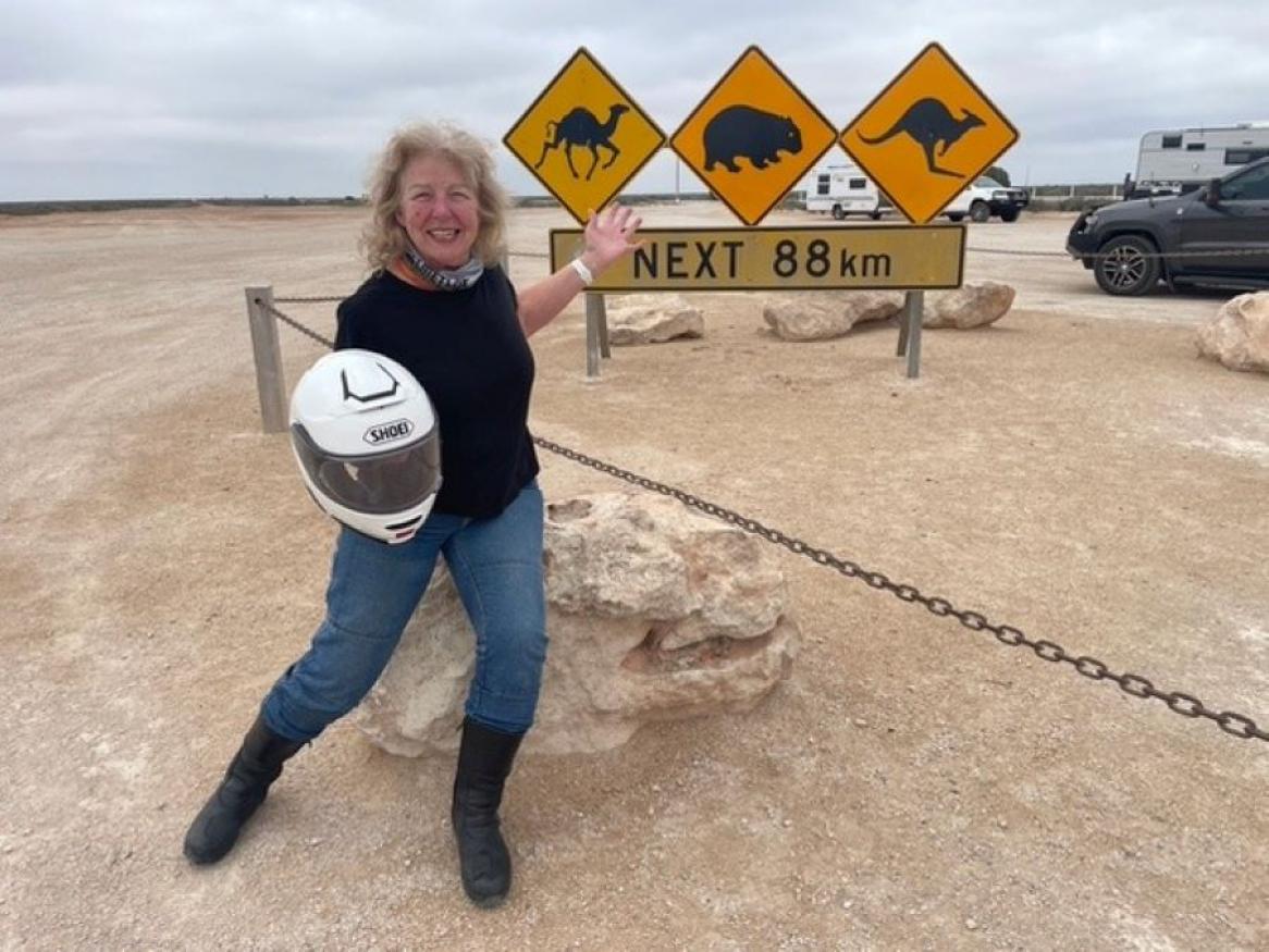 Neysa in the outback in motorbike gear