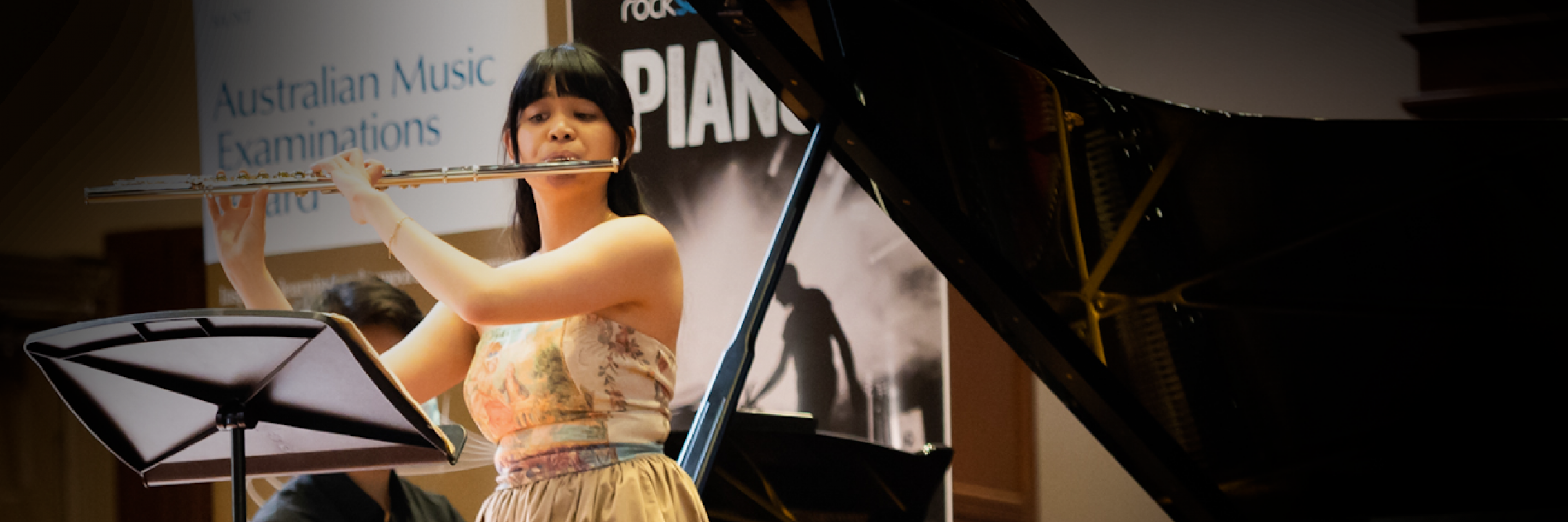 Flautist playing with piano
