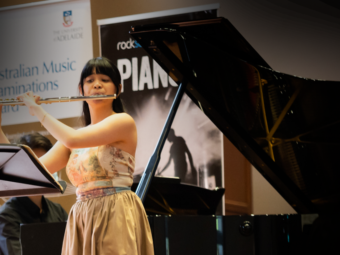 Flautist playing with piano