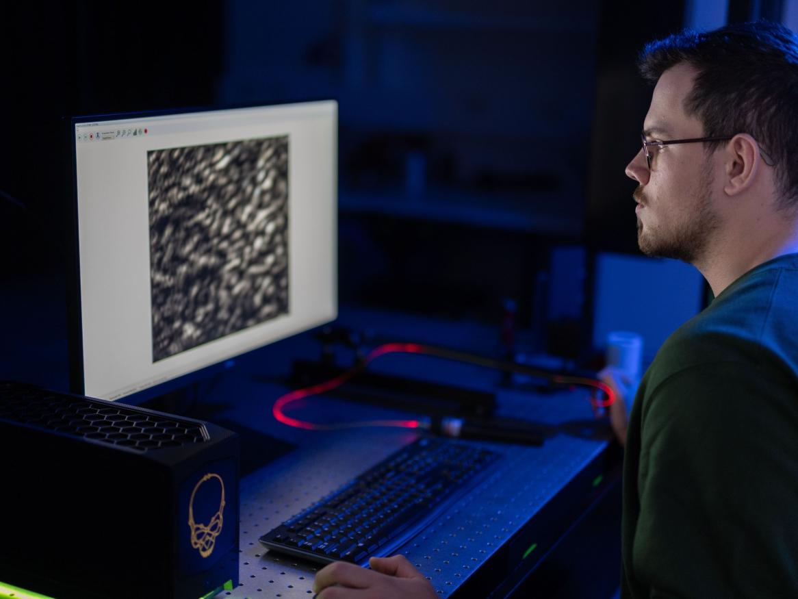 Researcher in front of computer