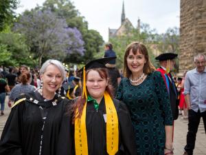 Student and parents outside Bonython Hall