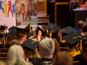 Students in graduation gowns