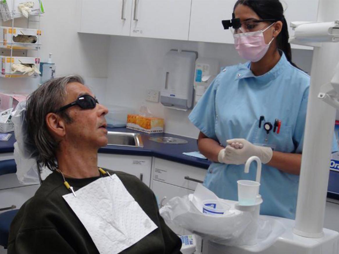 Community Outreach Dental Program student with patient