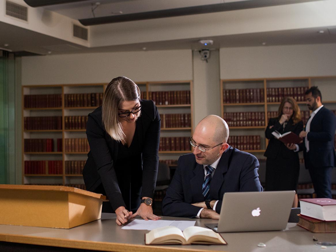 lawyers consulting at moot court