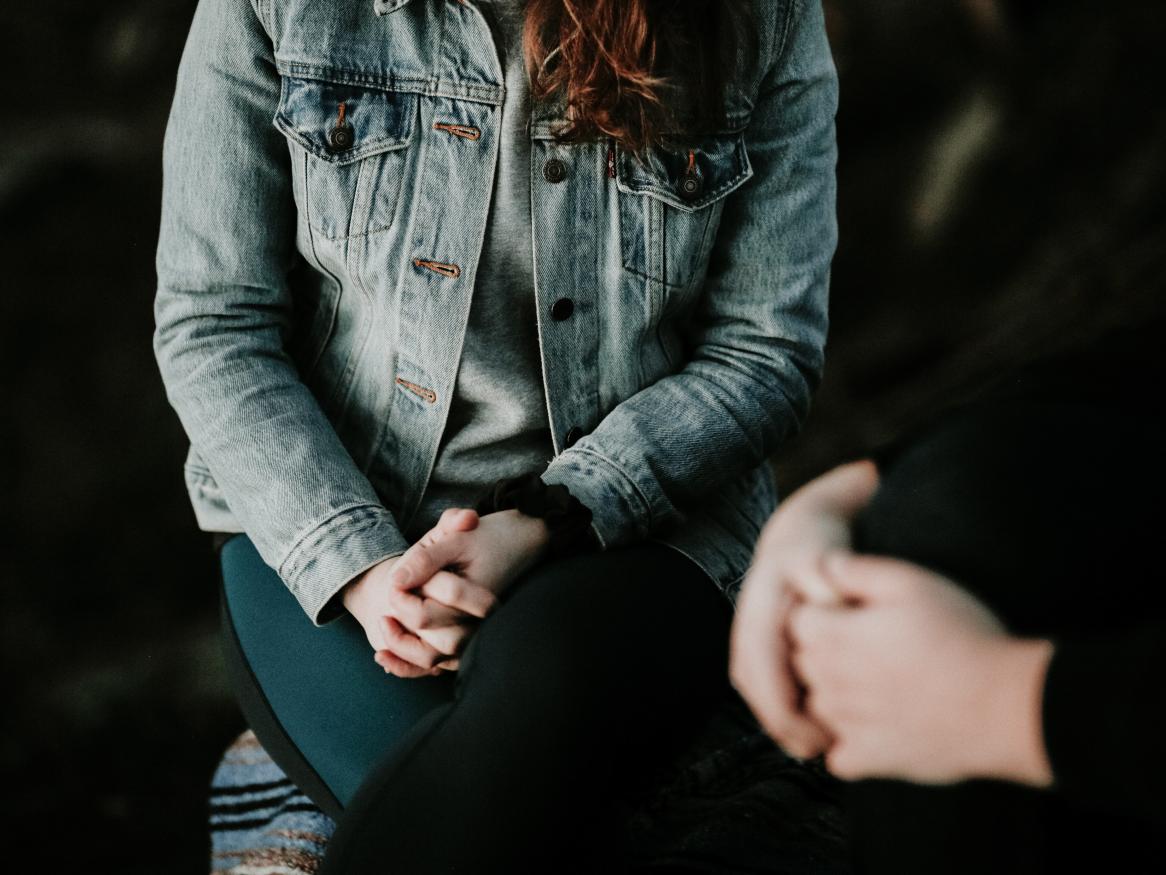 two people seated image