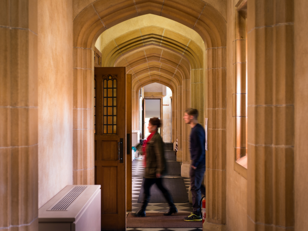 Students are walking through the corridors in Bonython Hall