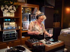 A DJ spinning vinyl records
