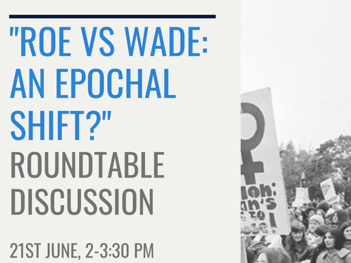 Shows a poster that reads: "Roe Vs Wade: An Epochal Shift? Roundtable Discussion