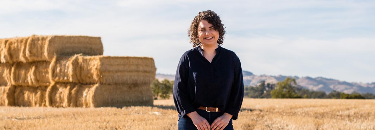 2020 ASA Appeal Kathryn in field with haystack background