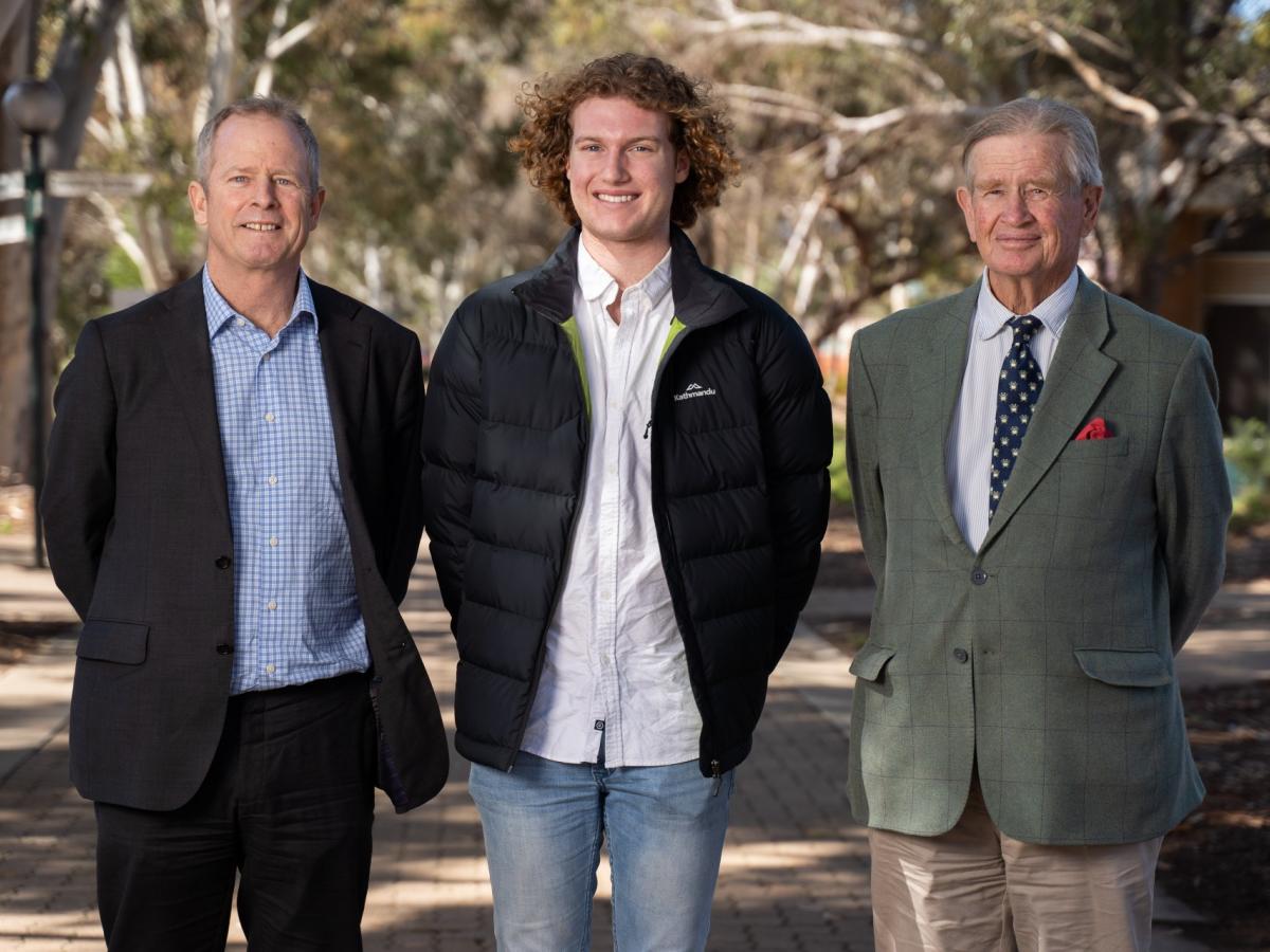 The trustees for the Commonwealth Hill Trust pictured with scholarship recipient Cooper