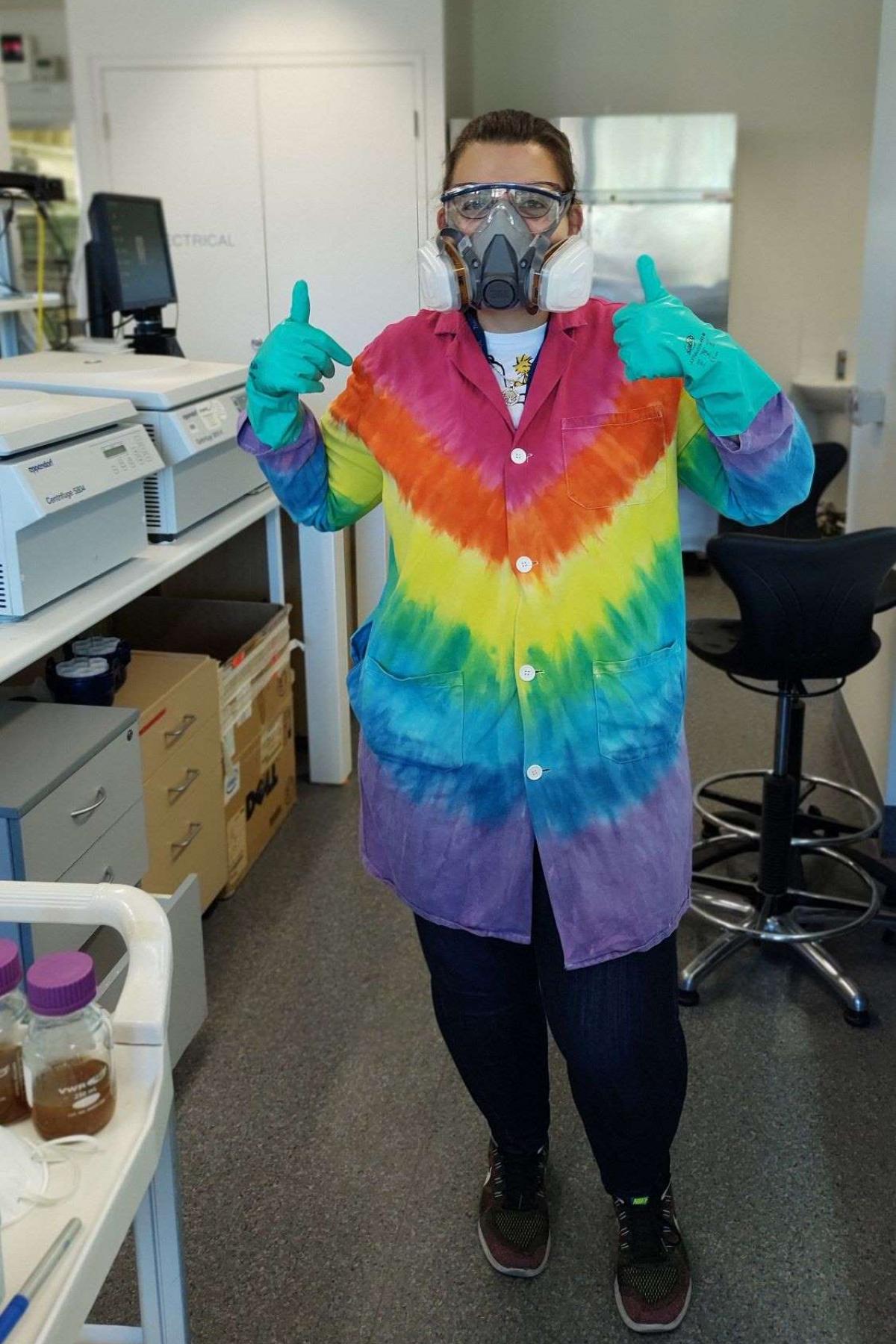 Image of female wine researcher in rainbow lab coat