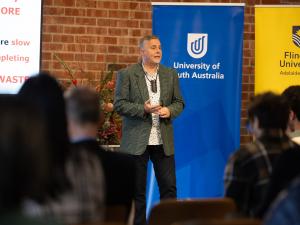 Henry Sukhinin presenting at Falling Walls Lab Adelaide 2025