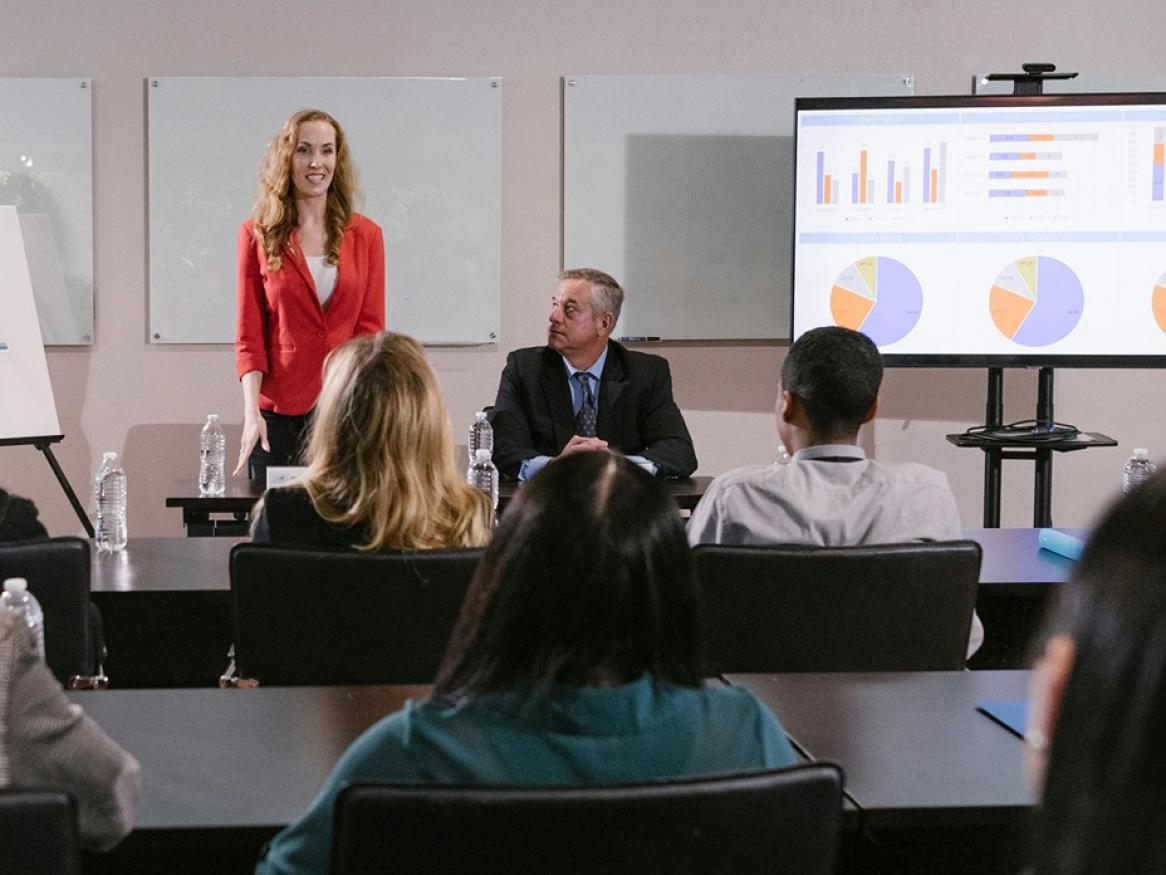 People presenting at a workshop