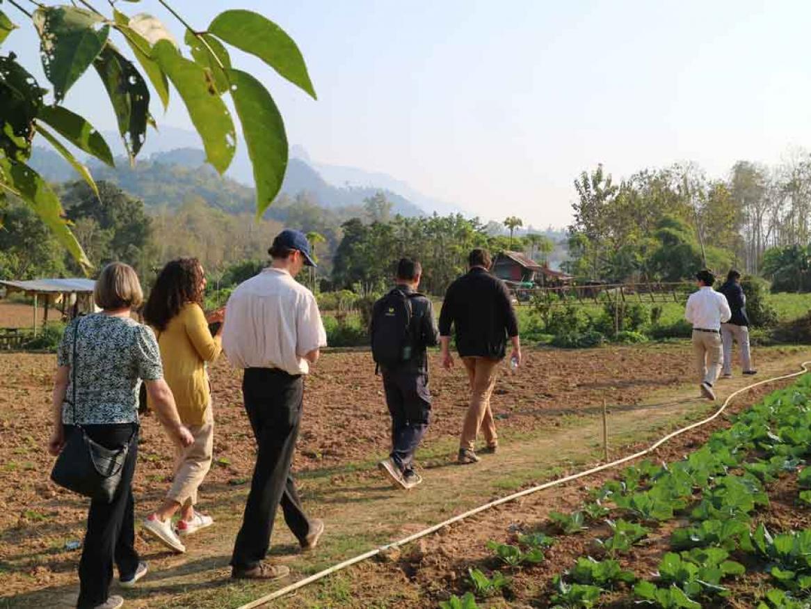 Project team visiting farm in Xienglom village, Luang Prabang